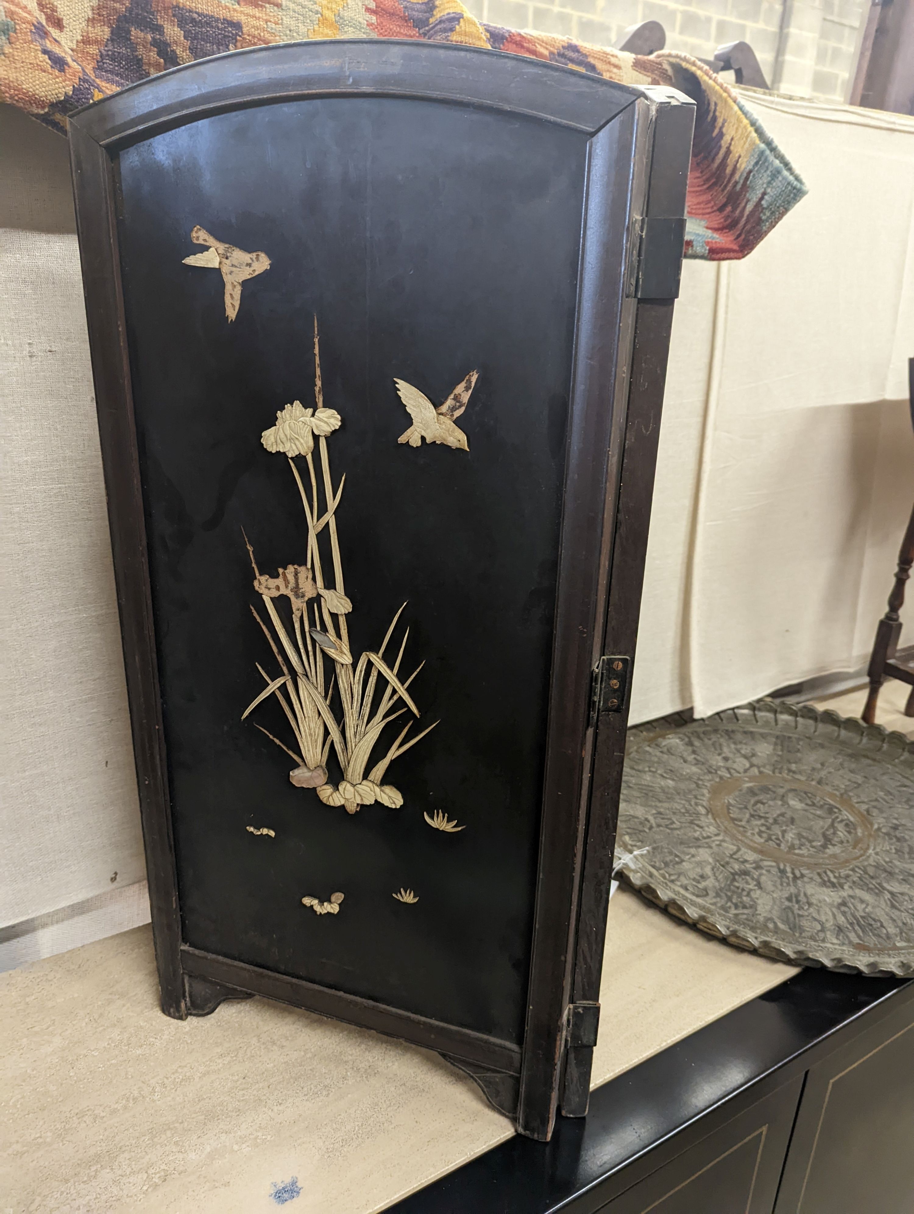 An early 20th century Shibayama type bone mounted lacquer two fold table screen, each panel width 41cm, height 85cm